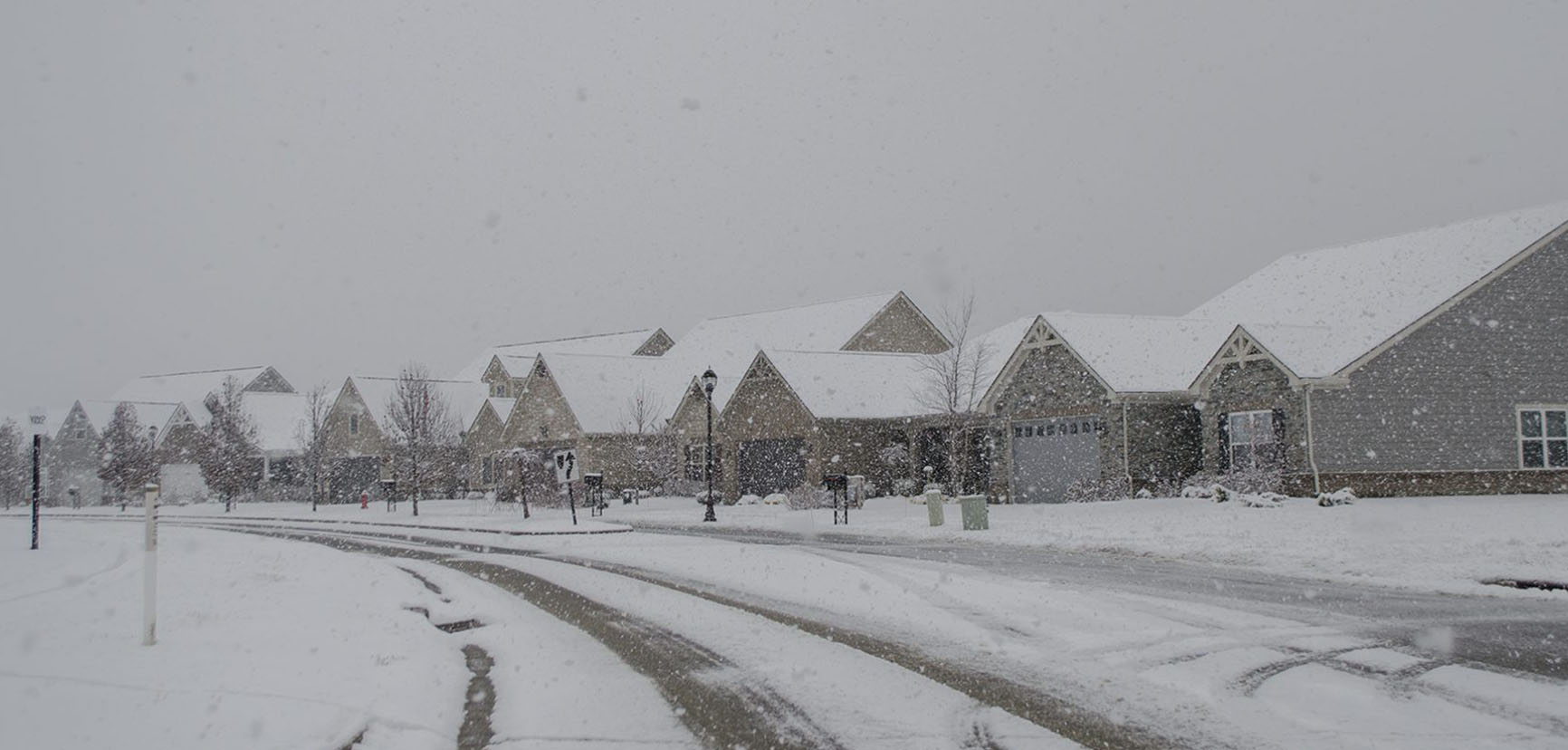 snowy road and neighborhood