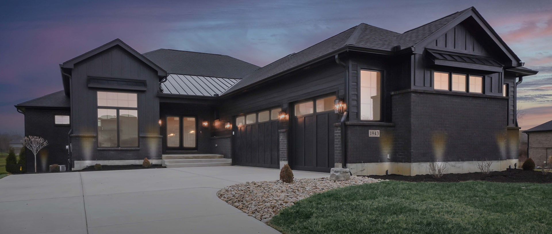 Design Homes Lot 249 exterior front of home at night