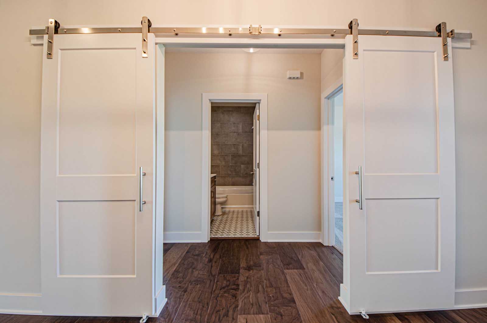 Design Homes The Magnolia closet leading to bathroom