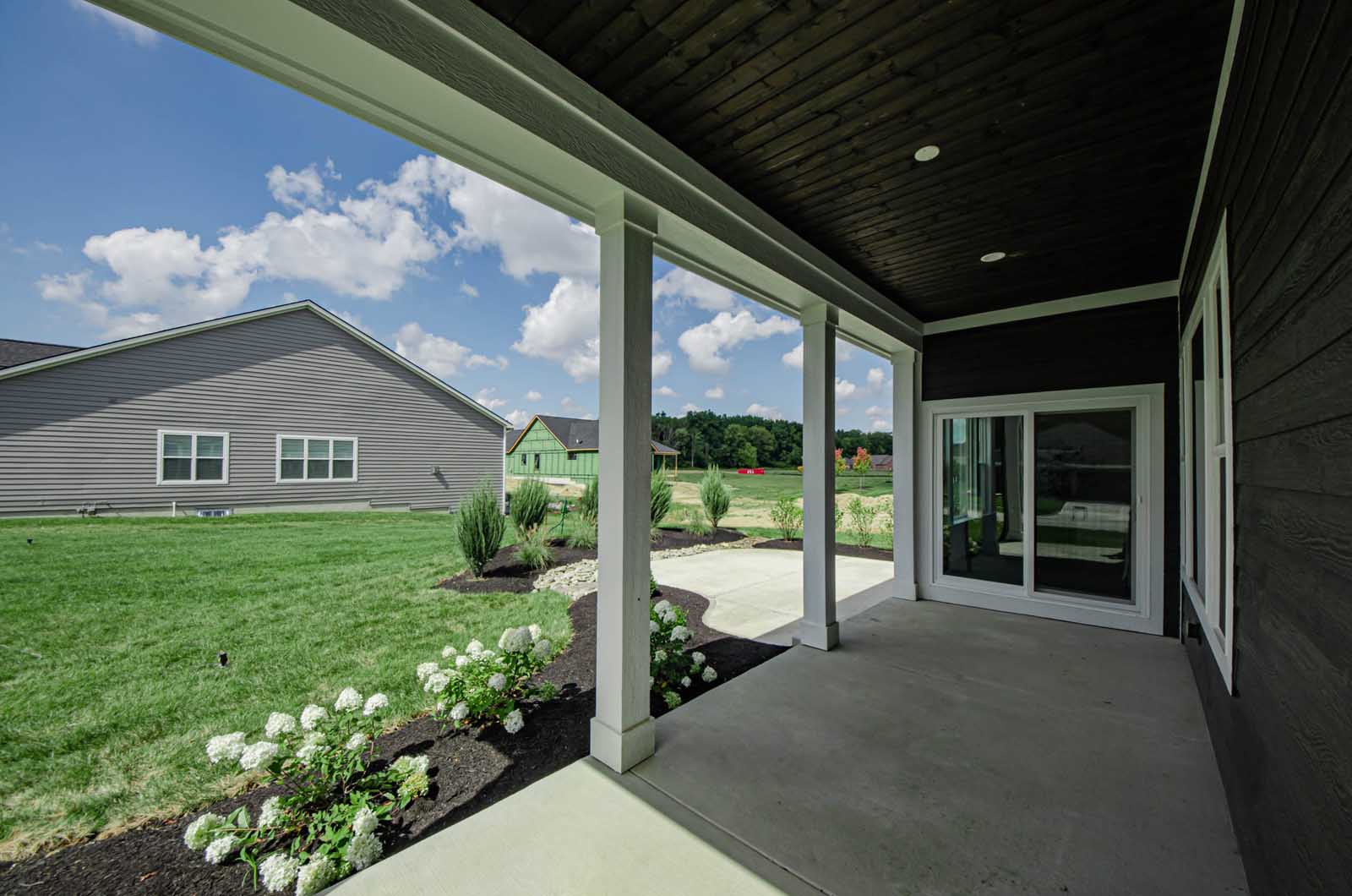 Design Homes The Willow exterior covered porch